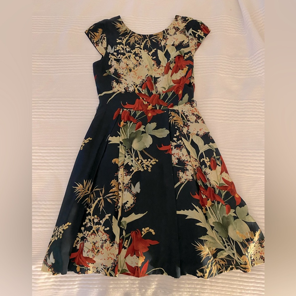 Knee length Ted Baker dress, retro feel with a cinched waist + crinoline